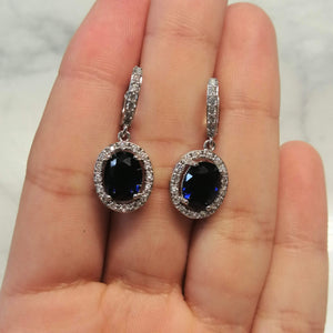 AP195 ARETES PLATA CIRC C/MARCO HUGGIES AZUL